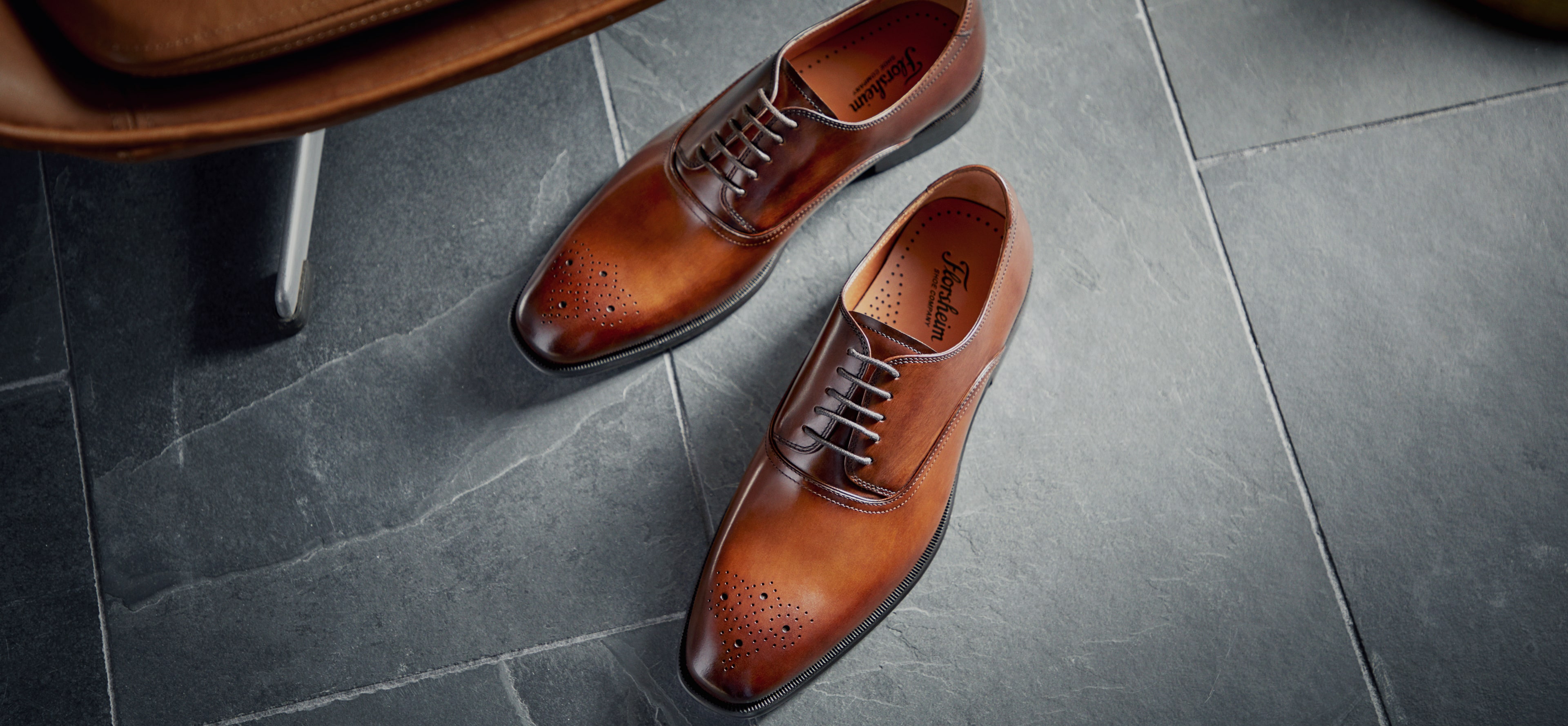 The featured shoe in this image is the Highland Canvas Plain Toe Oxford in Navy.