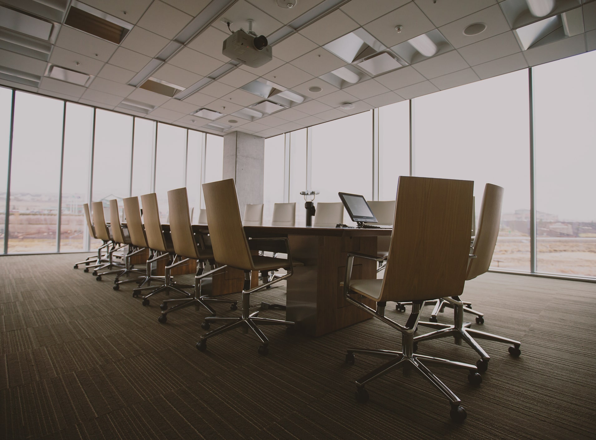 The featured image is a board room with multiple chairs. Click to learn more about Weyco and its relevant investor information.