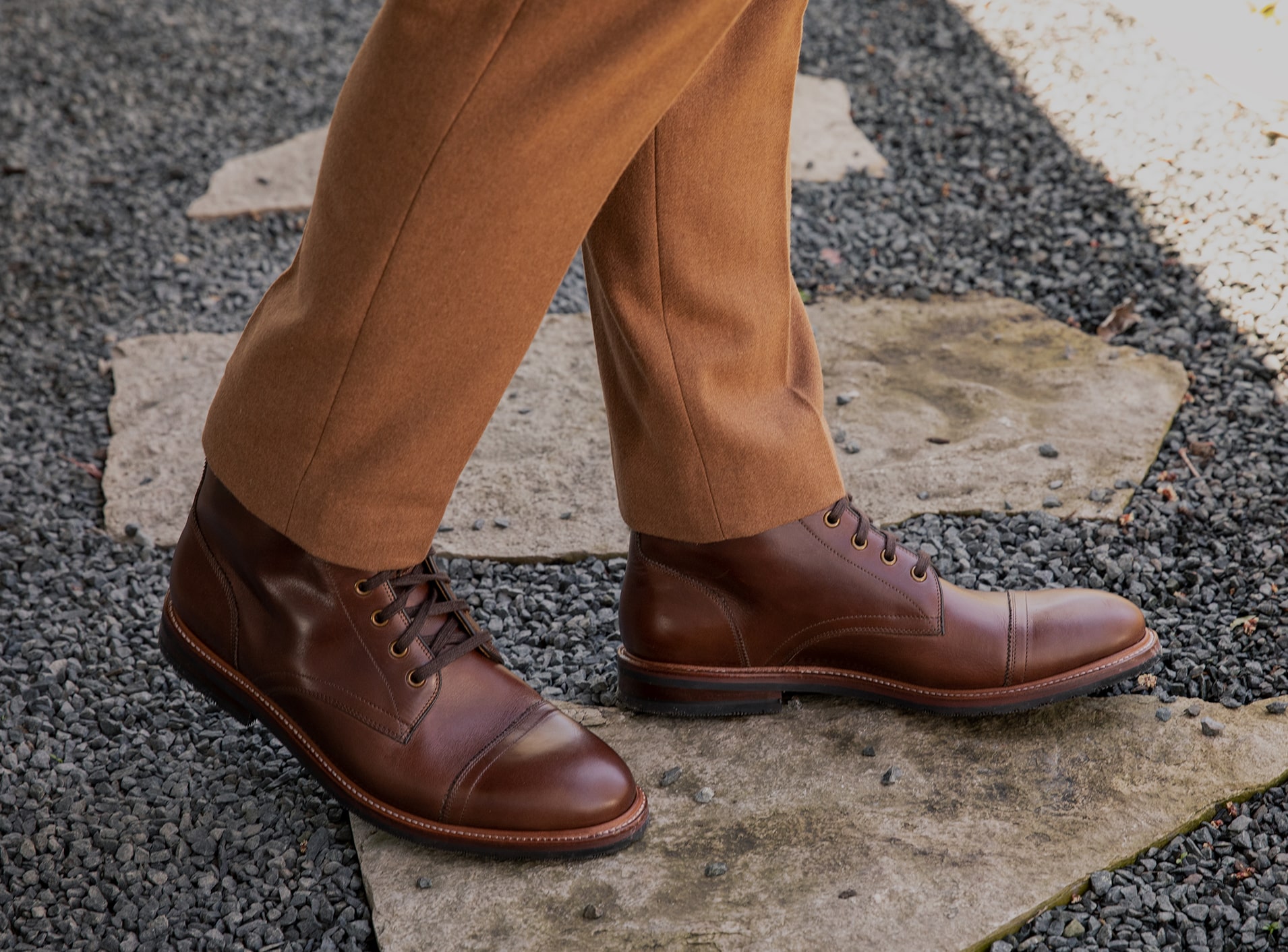 The featured shoe in this image is the Postino Cap Toe Oxford in Cognac. Click to learn more about each brand in the Weyco portfolio. 